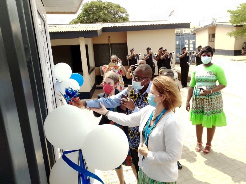 Anne Dufay (left), ACP Adjei and Miss Nippil of Global Affairs Canada cutting the ribbon to commission the interview room in Ashaiman
