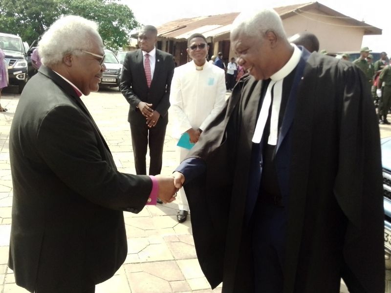 Professor Emmanuel Martey left, former Presby Moderator, welcomes Rev. Ahwireng, at last Sunday's church service and fundraising - 50th Ann