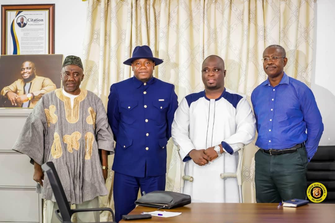 (second left) Alhaji Farouk Aliu Mahama, GIISDEC Board Chairman and MP for Yendi, and Mr. Joshua Makubu, Oti Regional Minister, in clutches