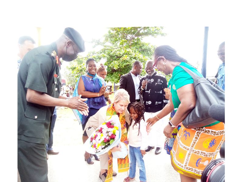 The President of Rotary International, Jennifer Jones being presented with a flower by little Zibborah Nutsi, a patient on admission at the 37 Military Hospital Children's Ward.