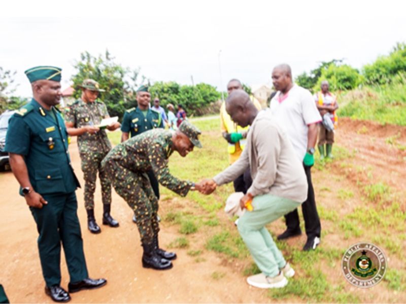 The Comptroller-General of Immigration, Mr. Kwame Asuah Takyi exchanging pleasantries with King of the Dorma Traditional Area, Dormahene Nana Agyemang Badu II