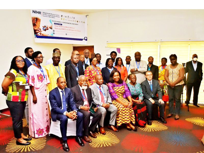 Ghana’s Minister for Health, Kwaku Agyeman-Manu (3rd from L) in a photograph with officials of NIHR and NIHR STOP NCDs implementing partners after the launch