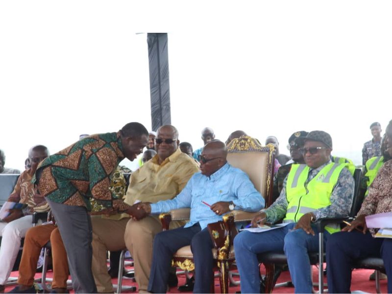 Member of Parliament, Ningo-Prampram, Samuel George, greeting President Akufo-Addo yesterday at Afienya
