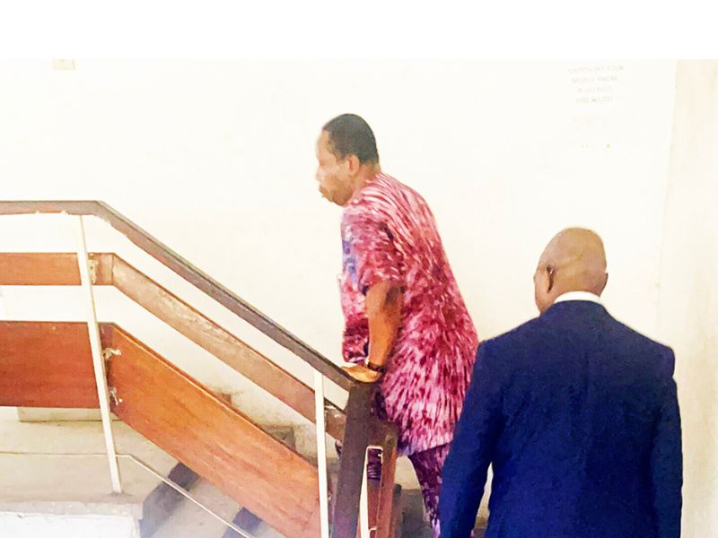 Ogun-speaker-Olakunle-Oluomo-ascending-the-staircase-of-the-Federal-High-court-in-Abeokuta-Ogun-state.