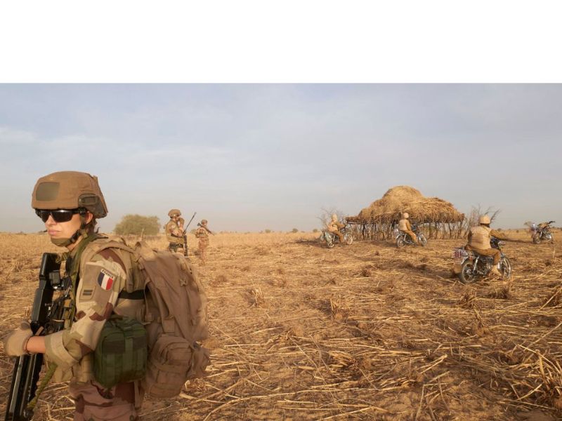 A soldier of the French Army patrols a rural area during the Barkhane operation in northern Burkina Faso on November 9, 2019
