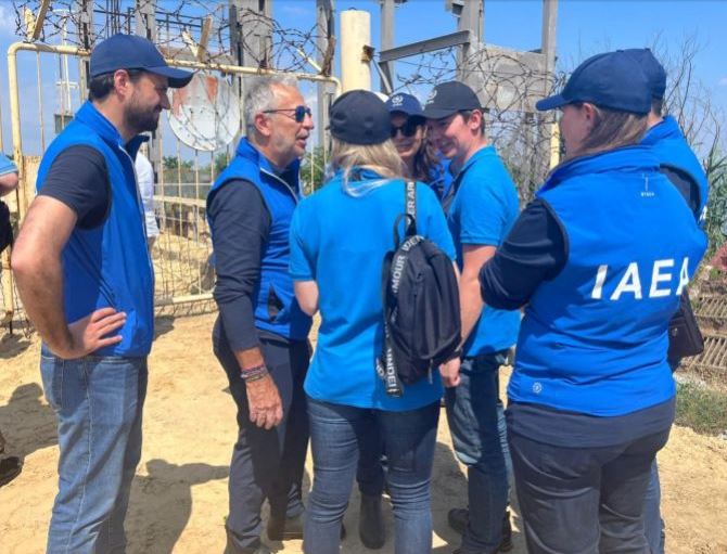 Members of an International Atomic Energy Agency expert mission inspect conditions at the Zaporizhzhia Nuclear Power Plant after a dam whose water is used to cool the facility’s reactors burst last week
