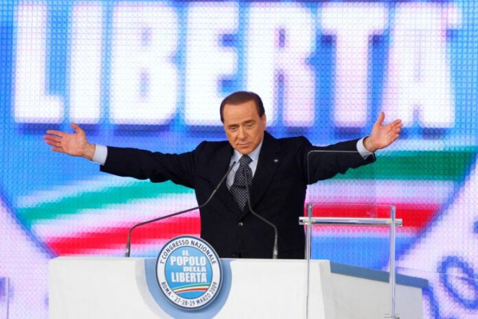 Italy's Prime Minister Silvio Berlusconi speaks at the opening of his People of Freedom bloc congress in Rome, Italy