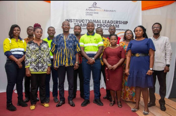 A group picture of officials of the education Directorate, AngloGold staff and facilitators at the closing ceremony