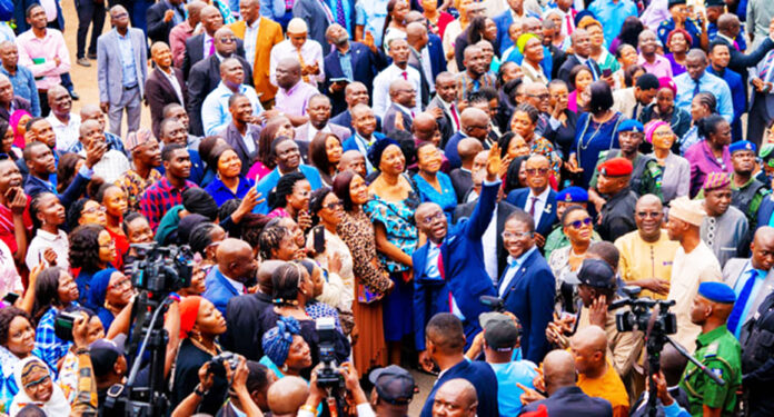 Lagos State Governor, Mr. Babajide Sanwo-Olu (middle) acknowledging cheers from Lagos Civil Servants