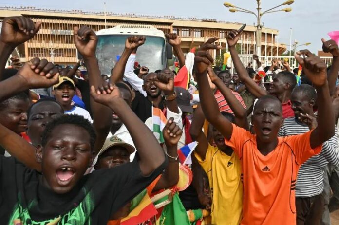 Supporters of Niger's National Council for the Safeguard of the Homeland (CNSP) demonstrate in Niamey on August 6, 2023