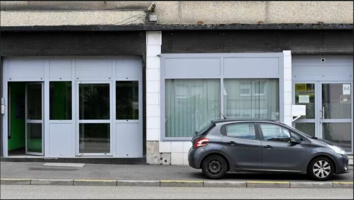 The entrance of the door of the building where the couple lived in Forbach, near France's border with Germany