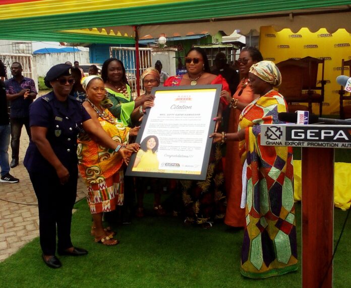 The CEO of the Ghana Export Promotion Authority, Dr Efua Asabia Asare 2nd from (right) and the Volta Women Icon (middle) and other officials