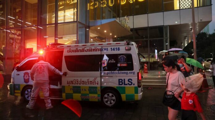 Emergency services arrive after a deadly shooting at a shopping mall in central Bangkok, in Thailand, on October 3