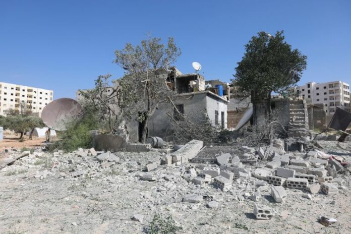 A building destroyed in the shelling from the Syrian government positions is seen in Idlib, Syria, Friday, October 6, 2023