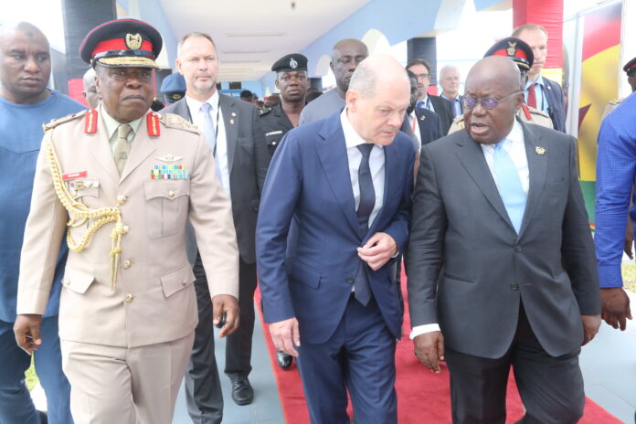 President Akufo-Addo and Olaf Scholz (left), German Chancellor departing the KAIPTC after a meeting.