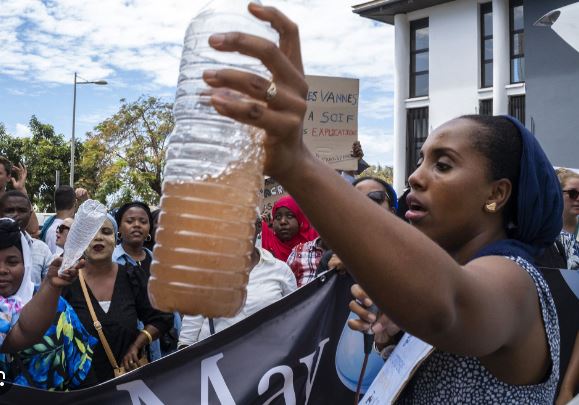 Racha Mousdikoudine protests water shortages in Mamoudzou on September 9, 2023. Amid the worst drought on the island since 1997, running water is only available one day out of three