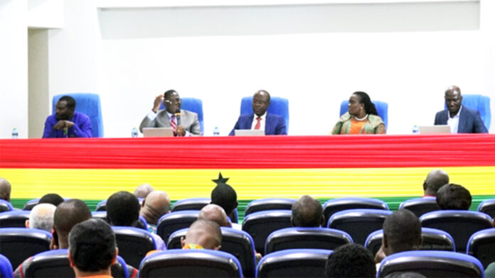 Deputy Director of Foreign Banking Operations at the Bank of Ghana, Eric Kweku Hammond (2nd left) during workshop