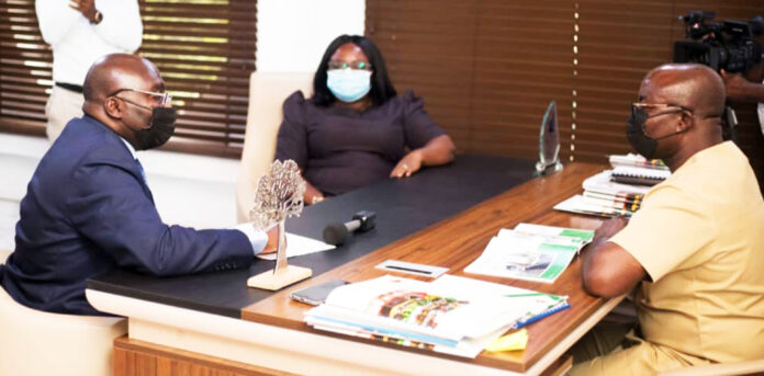 NSS Executive Director (right) briefing the Vice President (left) during a working visit to the NSS Headquarters in Accra last year