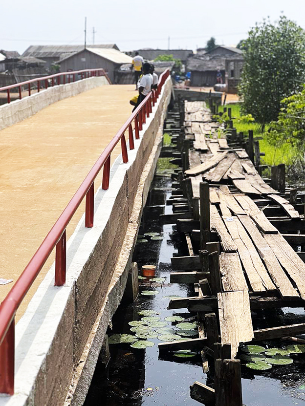 The reconstructed footbridge sponsored by Legislator Dorcas Toffey. inset is the hitherto death trap footbridge