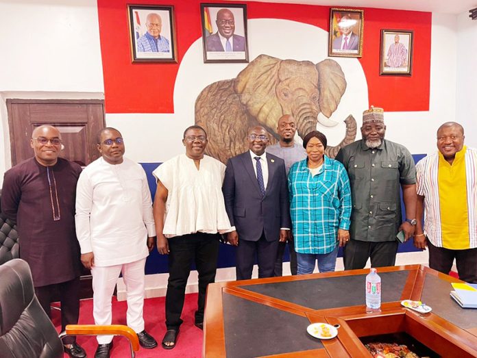 Dr. Mahamudu Bawumia (in suit) in a group photograph with some National Executives of the NPP at Asylum Down yesterday