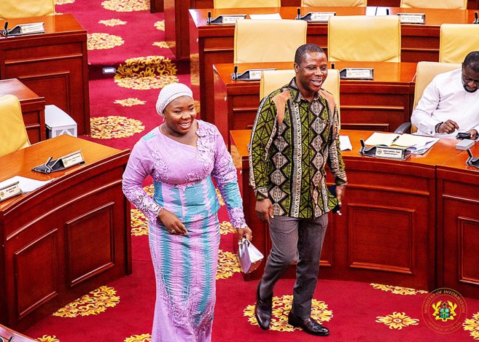 Minister for Information, Fatimatu Abubakar, and her Deputy, Slvester Tetteh arriving in the Chamber in a joyful mood