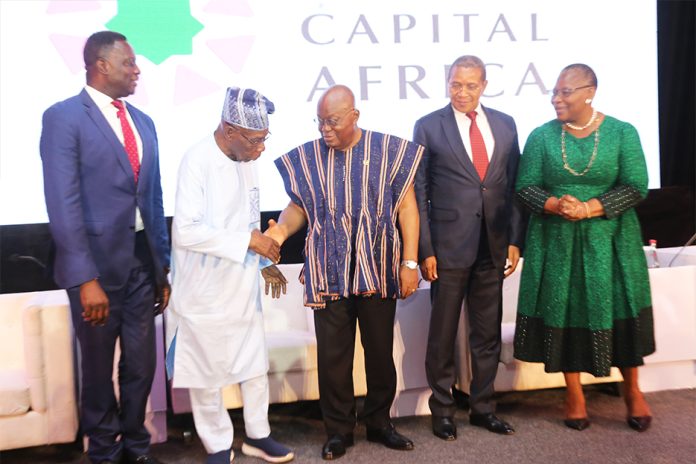 President Akufo-Addo (in smock) shaking hands with former President Olusegun Obasanjo (2nd from left), former President of Nigeria Presidential Media Briefing in Accra. With them are Jakaya Mrisho Kikwete