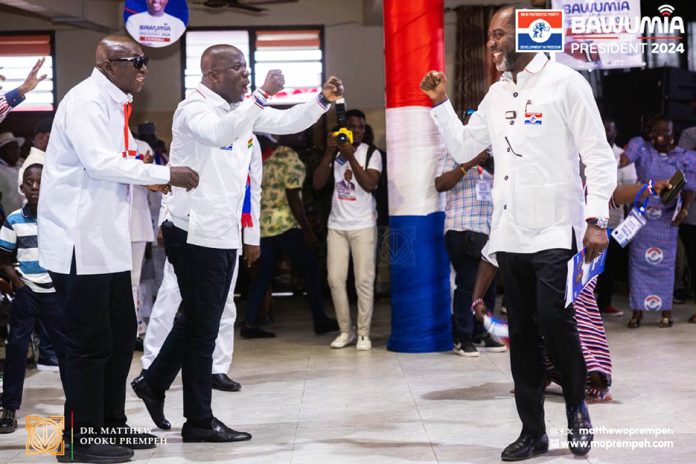 Minister for Lands and Natural Resources, Samuel Abu Jinapor (2nd left) cheering the running mate of NPP, Matthew Opoku Prempeh