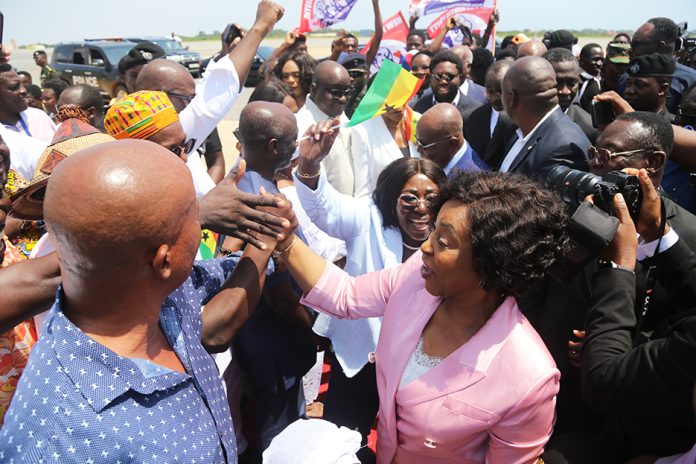 Newly elected Secretary General of the Commonwealth Shirley Ayorkor Botchwey shaking hands with Ghanaians who throng the airport to welcome her