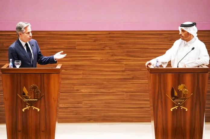 US Secretary of State Antony Blinken, left, and Qatari Prime Minister Mohammed bin Abdulrahman Al Thani