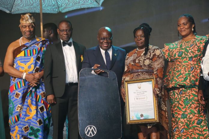 President Akufo-Addo (4th from right), presenting the overall best award to Vivian Opoku Kyeremeh at a colourful Ghana Health Sector Awards in Accra. With them are Adelaide Ntim (2nd from right), a Deputy Minister of Health, Dr. Patrick Kuma Aboagye (3rd from left), Director-General, Ghana Health Service, King Nii Tackie Teiko Tsuru II (2nd from left), Ga Mantse.