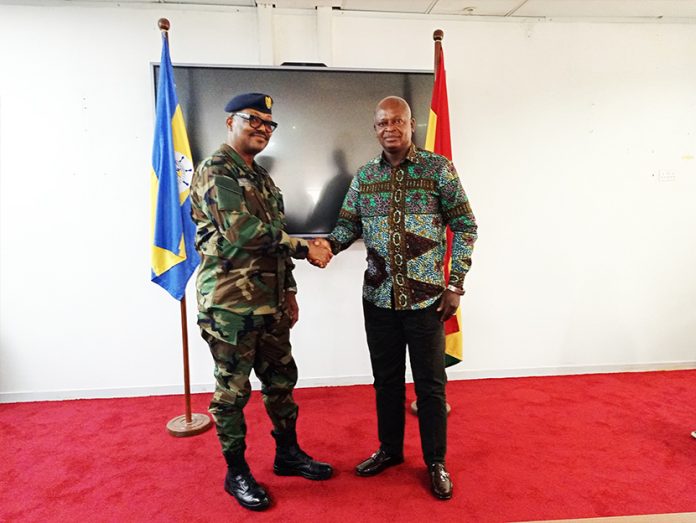 Brigadier-General Paul Seidu Tanye-Kulono, the Ag. Director-General GPHA with the Transport Minister