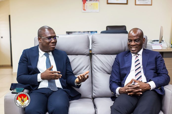 Honorary Consul of the Republic of Indonesia, H.E. Paskal A.B. Rois (right) in a conversation with Hon. Haruna Iddrisu, Minister for Education
