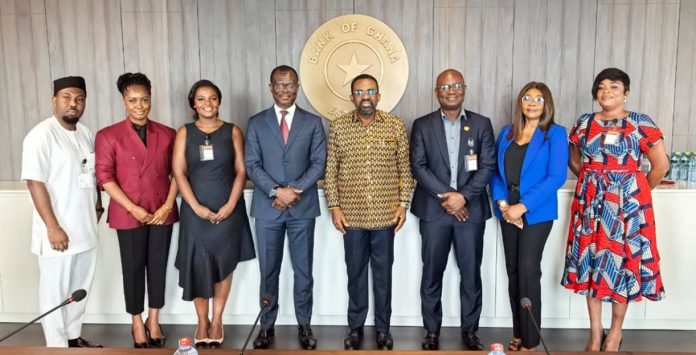 Dr. (Med) Baidoo (3rd right) and the Governor, Dr. Asiama (4th right), BoG management team and Dr. Asante-Manu (far left) after the meeting