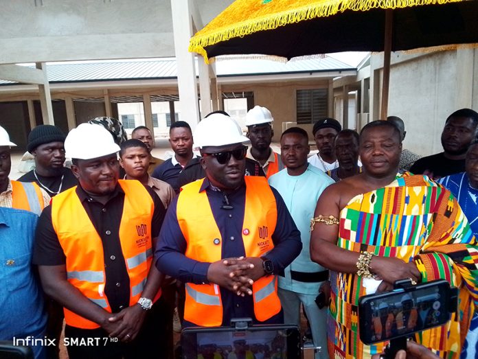 Dr. Frank Amoakohene (Middle), Abubakar Sedik (left) and Nana Agyemang Badu Duah I, Kunsuhene (right), at the stalled Agenda 111 project site