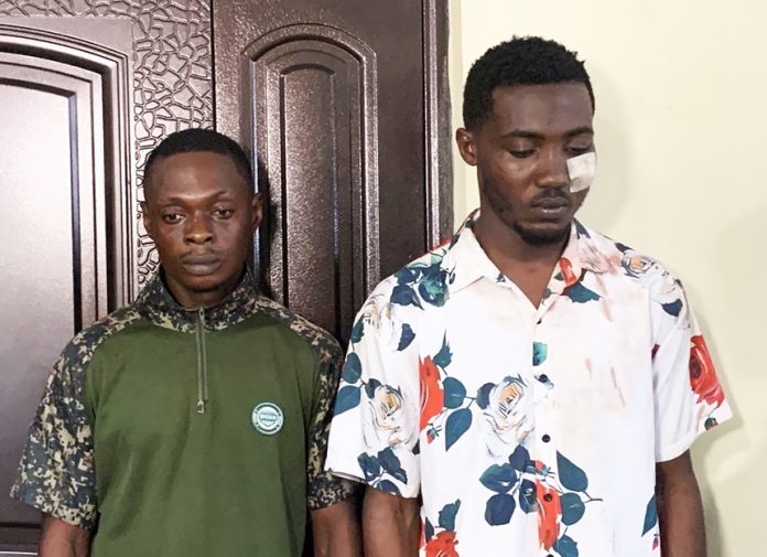 The suspects, Solomon Opoku and Collins Aboagye, who have been arrested by the police in connection with the case.