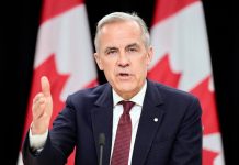 Canadian PM clears budget vote, averting snap elections