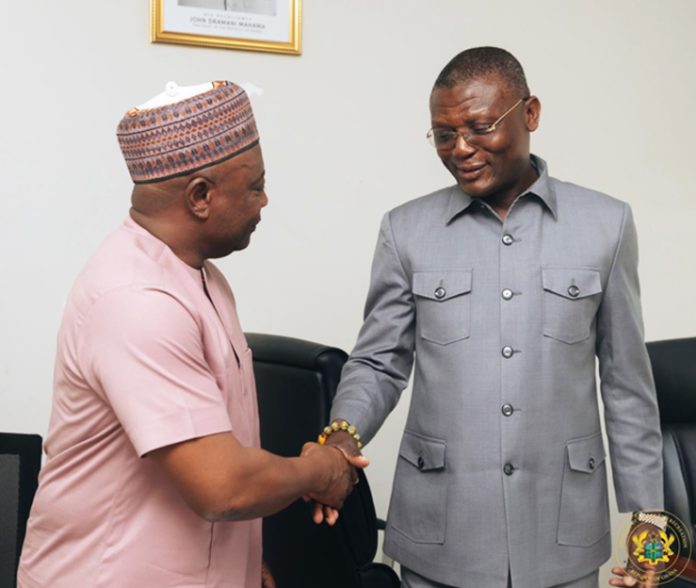 Football legend Abedi Pele and Minister for Sports Kofi Adams