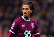 FA charges Burnley midfielder for allegedly spitting at fans