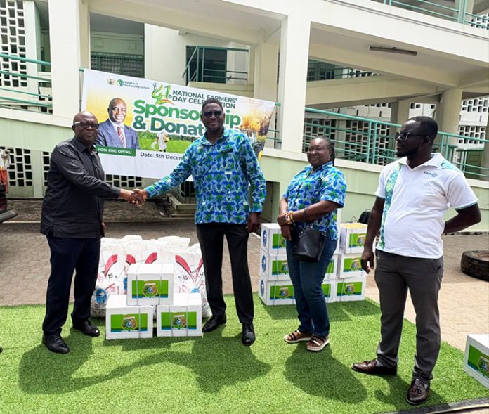 Officials of SOLEVO Group (l) handing over items to representative of MOFA, Chief Director, Mr. Paul Siameh