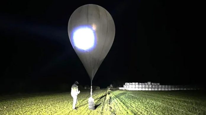 Giant balloons carrying contraband cigarettes are crossing the border from Belarus into Lithuania