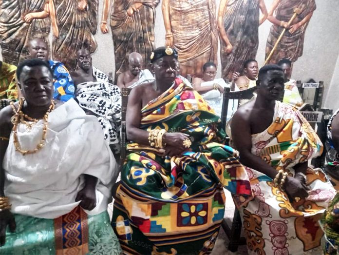 Okofrobour Nuako Obeng III (middle) sitting in state