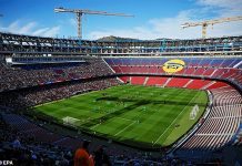 Barcelona’s newly-renovated Nou Camp flooded by heavy rain …club president drenched by downpour