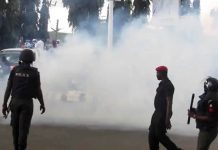 Police fire tear gas as protesters storm Lagos Assembly over demolitions