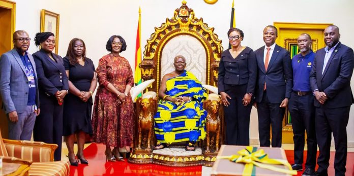 Access Bank delegation in a pose with Otumfuo