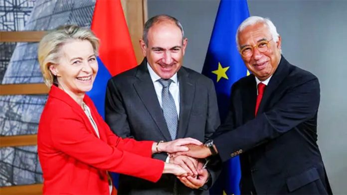 Armenia's Prime Minister Nikol Pashinyan (C) pictured with the leaders of the European Commission and European Council