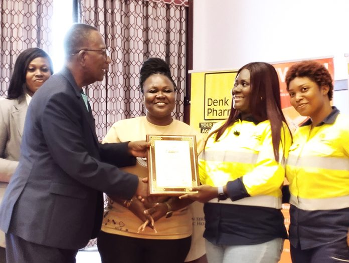 Ayisha Muhammed Aubyn (2nd right) receiving a citation on behalf of GFGF