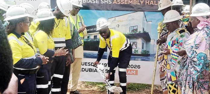 Edmund Oduro Agyei (middle) breaking the ground for commencement of the project