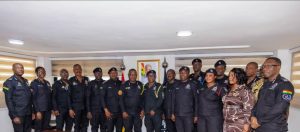 IGP Christian Tetteh Yohuno (middle) flanked by senior police officers and the five newly promoted officers — Chief Inspector Eric Otoo, Chief Inspector Emmanuel Otu, General Sergeant Philip Amoah, Policewoman Constable Victoria Asiedu, and Policewoman Constable Rosemond A. Frimpong — pose for a photograph to mark the occasion.