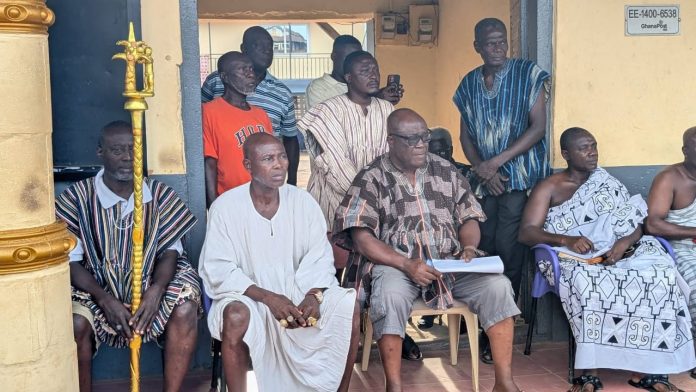 The chief of Akyem Tafo, Daasebre Adusei Peasah IV and a cross-section of his subjects at the emergency community meeting held in front of the Awansa Palace.