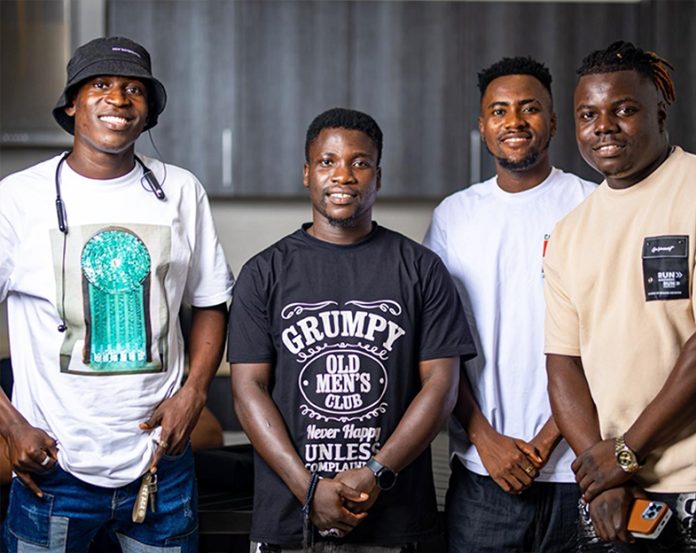Ananzo Official (2nd from left) with Management of CBShotIt Studio LLC